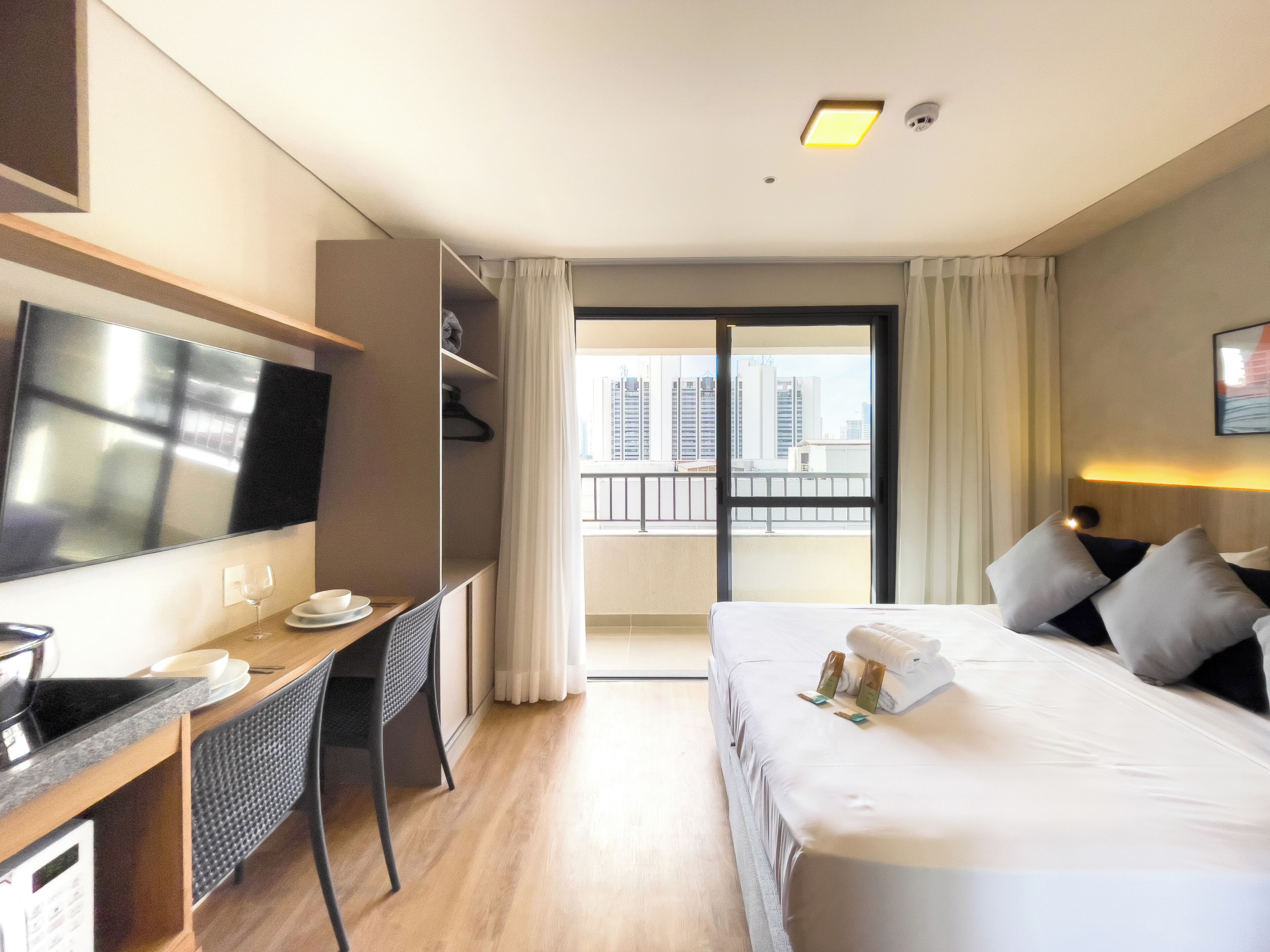 Studio | Hypo-allergenic bedding, laptop workspace, blackout curtains