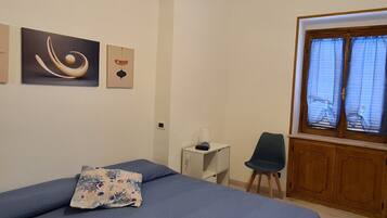 1 quarto, roupa de cama