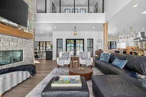 Smart TV, fireplace, books, offices