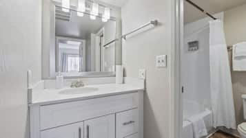 Hair dryer, towels, soap, shampoo