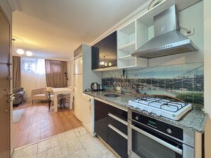 Fridge, oven, stovetop, dishwasher - Elegant 1BR Flat | Central & Stylish (Istanbul)