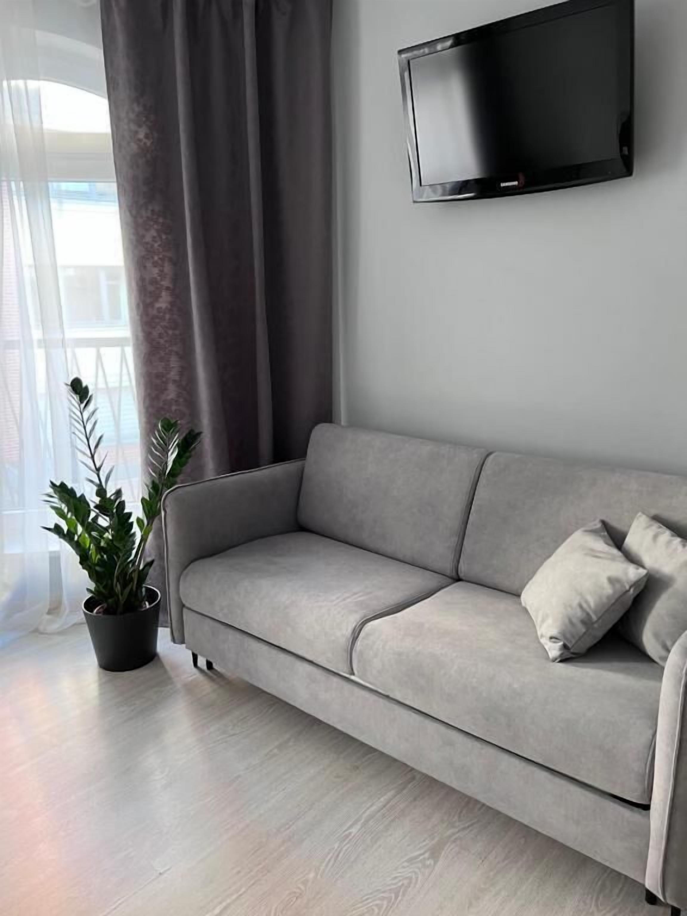 Superior Quadruple Room | Living area