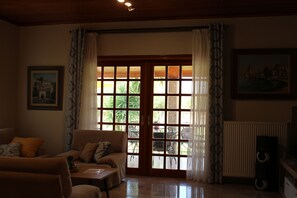 TV, fireplace - Gravanis Resort Luxury Villa with Private Pool in 30Acre Olive Grove near Athens (Sykamino)