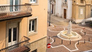 A building with balconies, a courtyard with a fountain, and classical architecture. - Coconut House (Alzano Lombardo)
