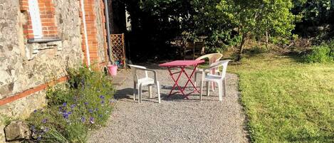 Huis, uitzicht op tuin | Buiten dineren