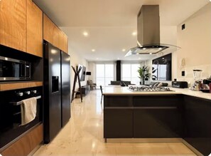 Private kitchen - Cozy and modern apartment. (Juriquilla)