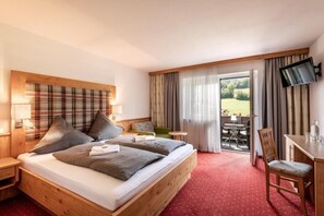 Kolmen hengen deluxe-huone