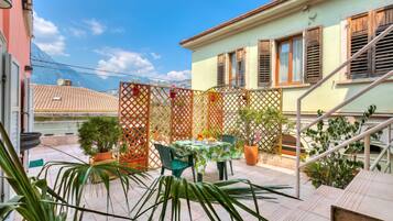 Standard Room, Multiple Bedrooms (Vida Boa Queen Room) | Outdoor dining
