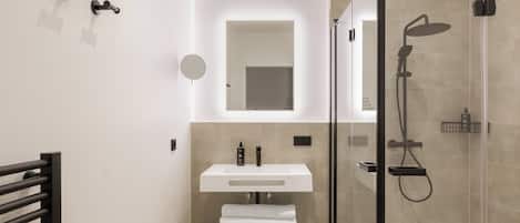 Shower, eco-friendly toiletries, hair dryer, towels