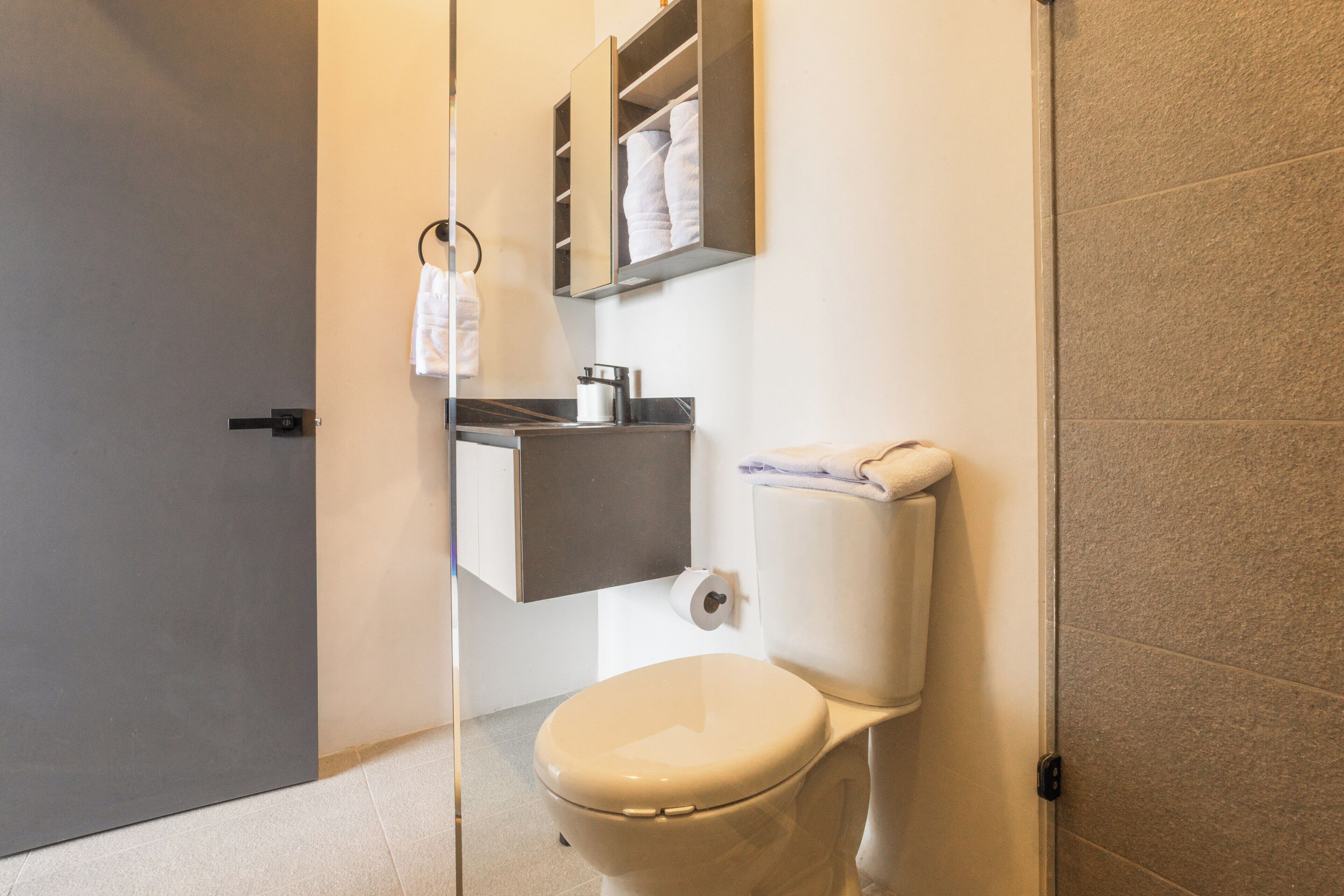 Shower, rainfall showerhead, towels
