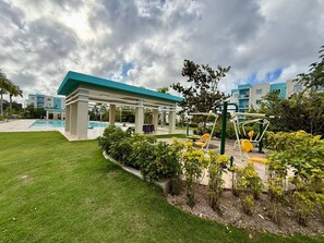 Apartment, 2 Bedrooms, Accessible, Smoking | Pool | Outdoor pool - Modern Comfort in Serena Village Your Punta Cana Retreat (Punta Cana)