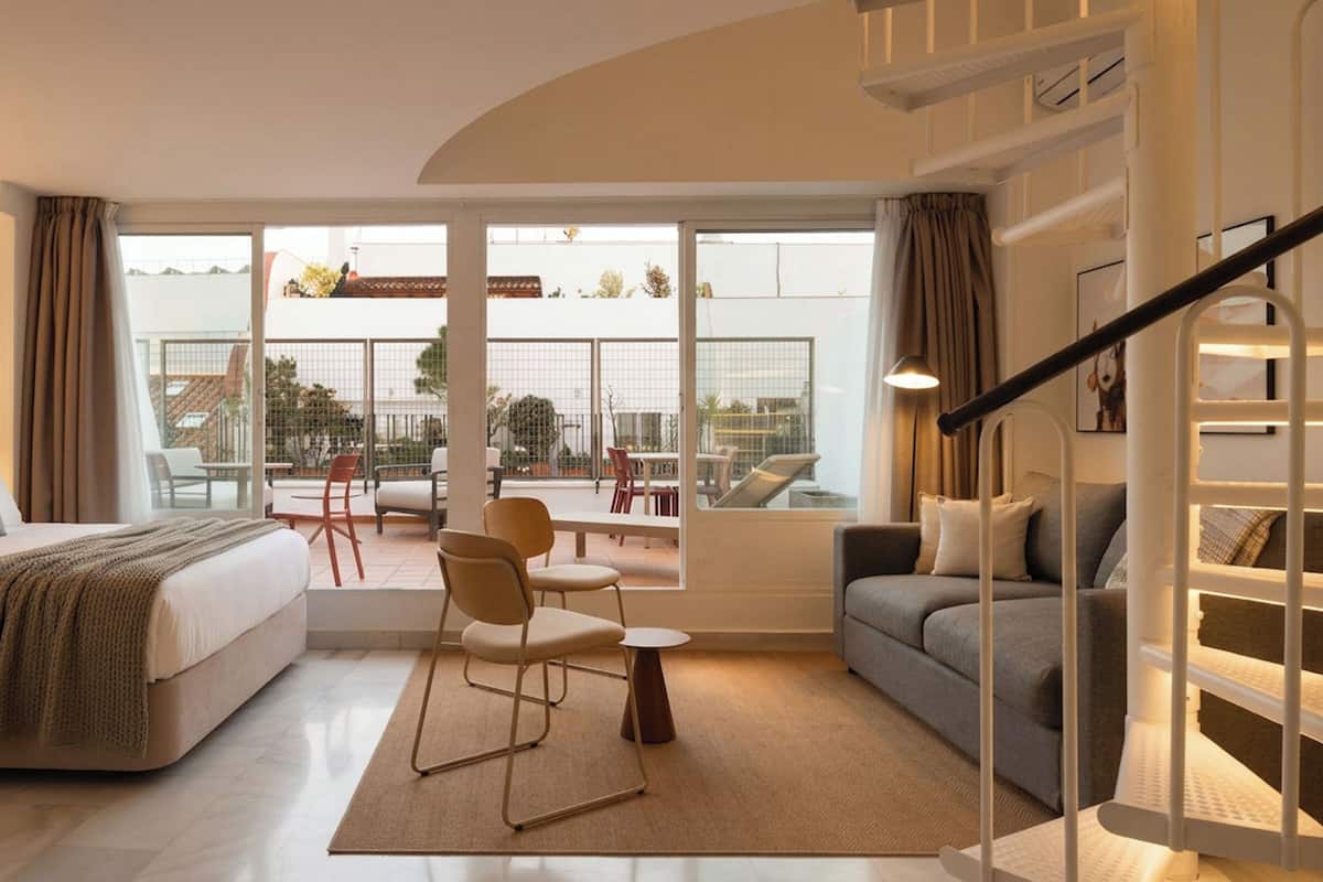 One-Bedroom Apt with rooftop terrace | Living area | 43-inch flat-screen TV with cable channels