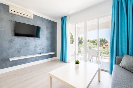 Living area. Apartment 'A De 1 Dormitorio' with Shared Pool, Wi-Fi and Air Conditioning
