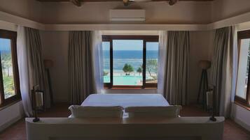 Panoramic Suite, Sea View | Egyptian cotton sheets, premium bedding, memory-foam beds, minibar