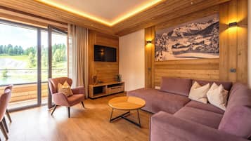 Apartamento Deluxe, balcón, vistas al lago | Zona de estar