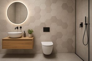 Vasca idromassaggio, asciugacapelli, bidet, asciugamani
