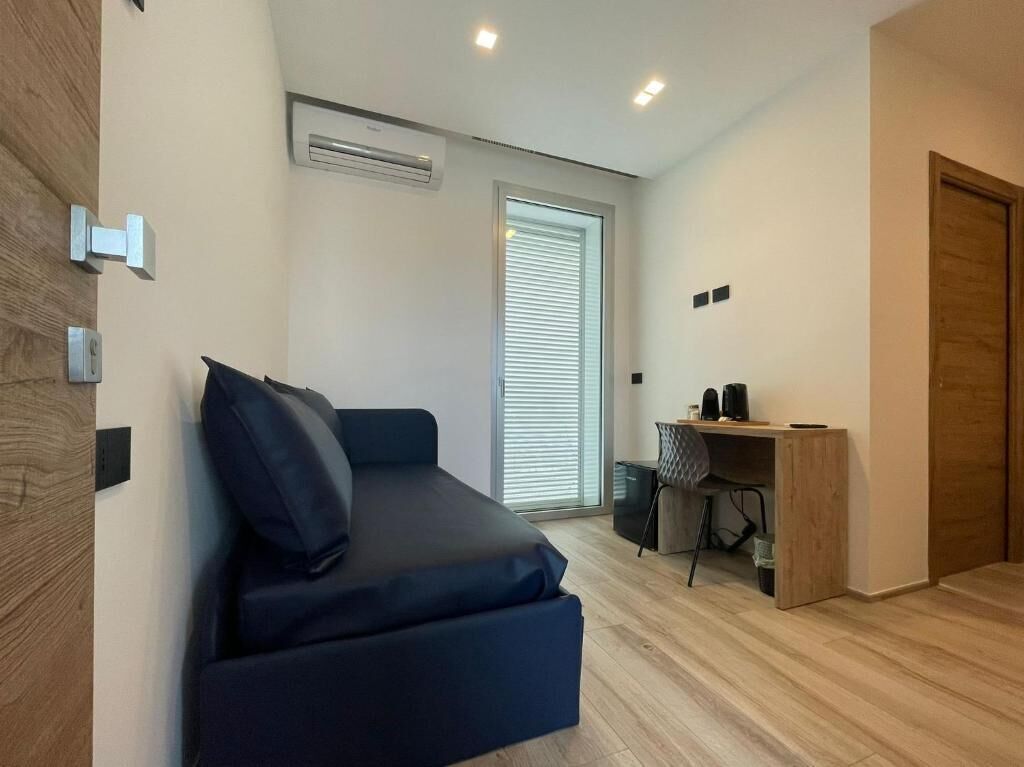 Double Room, Balcony | Living area