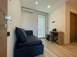 Camera doppia, balcone | Area soggiorno