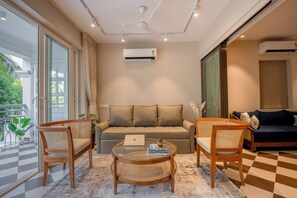 Apartment, 2 Bedrooms, Kitchen | Living area | 42-inch Smart TV with digital channels - Staymaster Solintra 2BHK C402 (Verem)