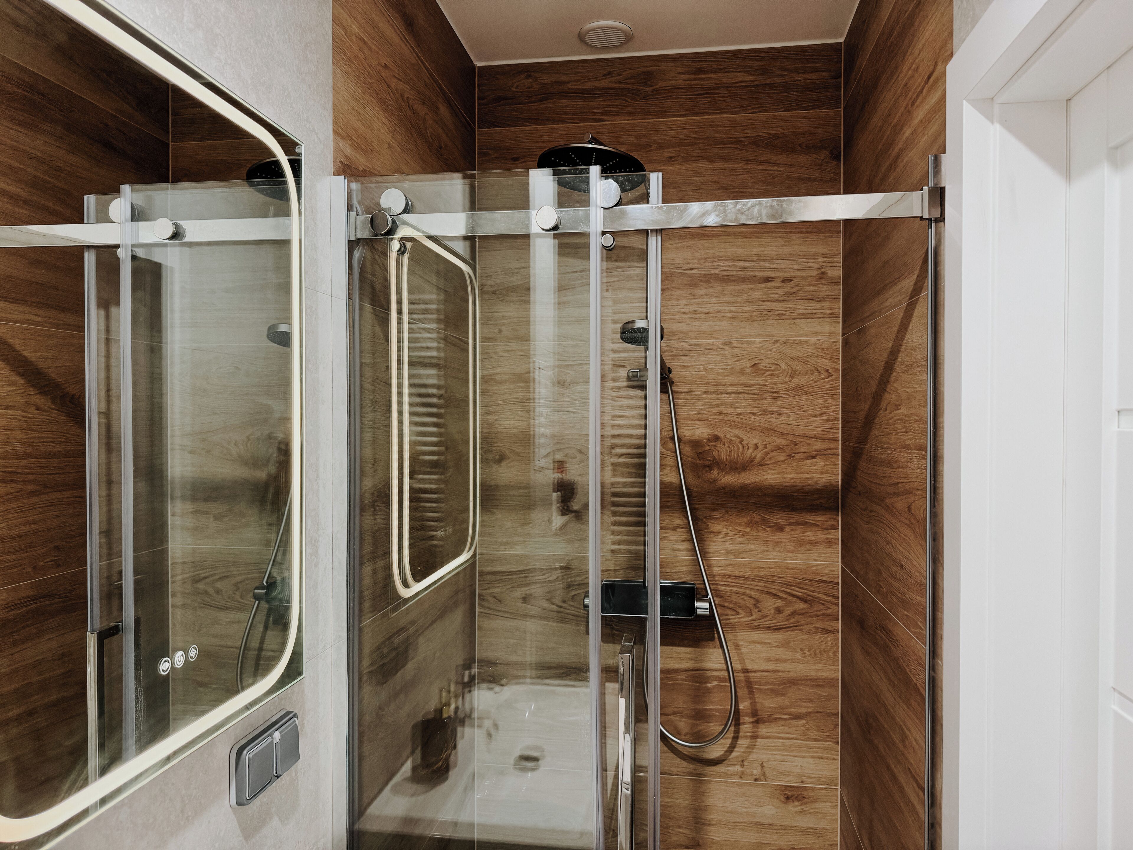 Shower, hair dryer, towels, toilet paper