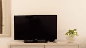 Suite, 1 cama matrimonial, vista a la ciudad | Interior