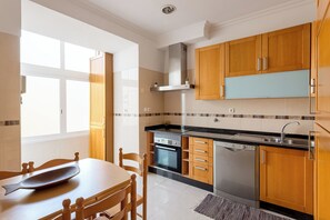 Fridge, microwave, oven, stovetop - Graça Secret Village – 2BR Retreat (Lisbon)