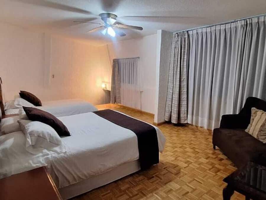 Family Apartment, 2 Bedrooms, City View | In-room safe, desk, laptop workspace, blackout drapes