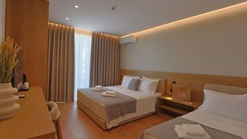Deluxe Triple Room, Balcony, Sea View | Desk, WiFi (free)