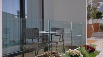 Economy Triple Room, Balcony, Garden View | Balcony view