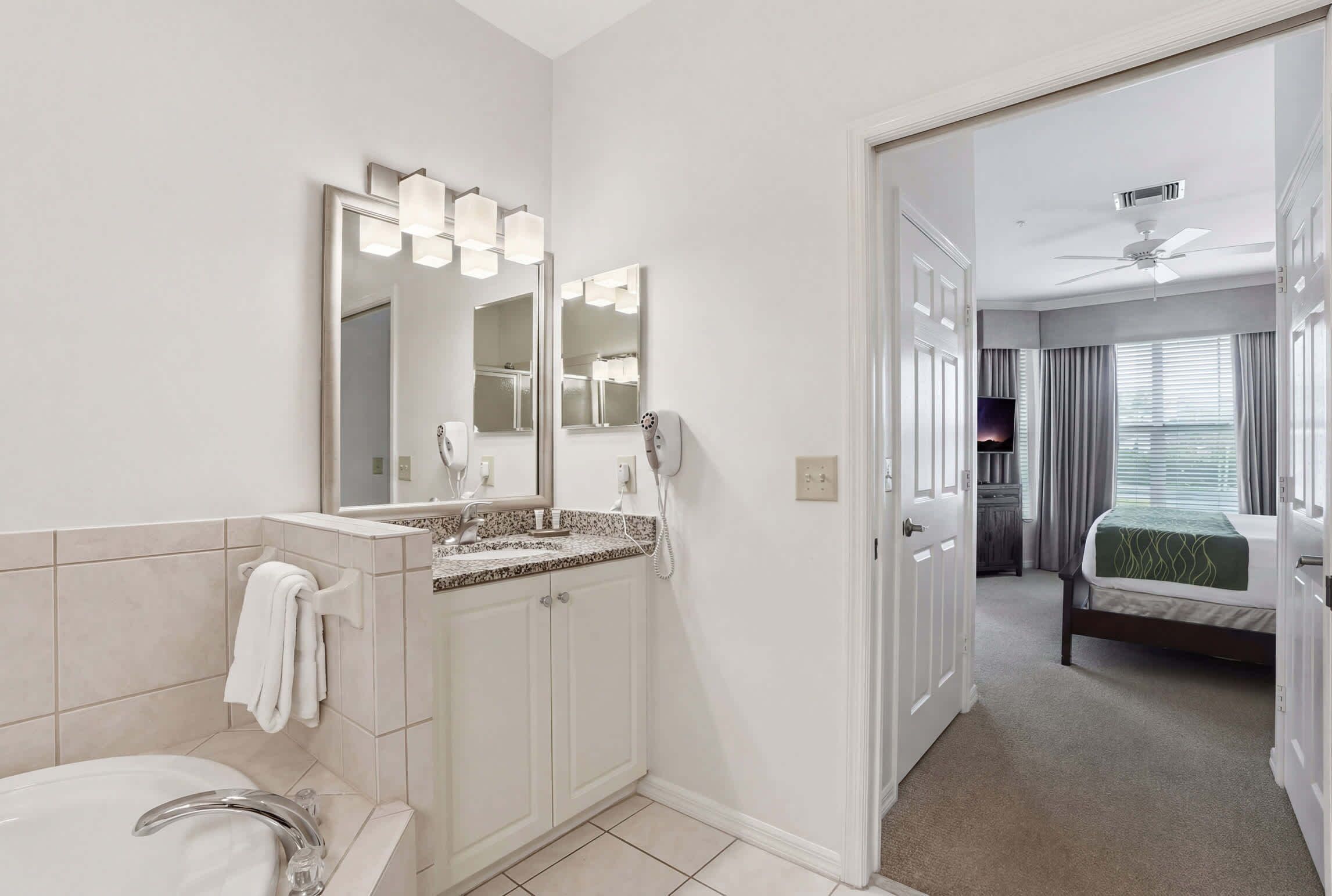 Shower, hair dryer, towels, shampoo