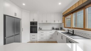 Private kitchen - Route 86 Bright stunning holiday home with private pool. (Bright)