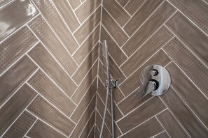 Luxury Double Room, Partial Sea View | Bathroom | Shower, rainfall showerhead, eco-friendly toiletries, hair dryer