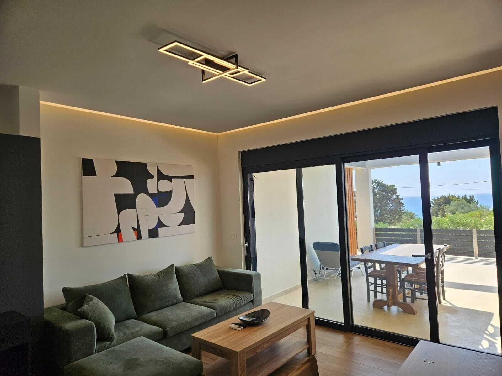 Suite Junior, véranda, vue partielle sur la mer | Coin séjour