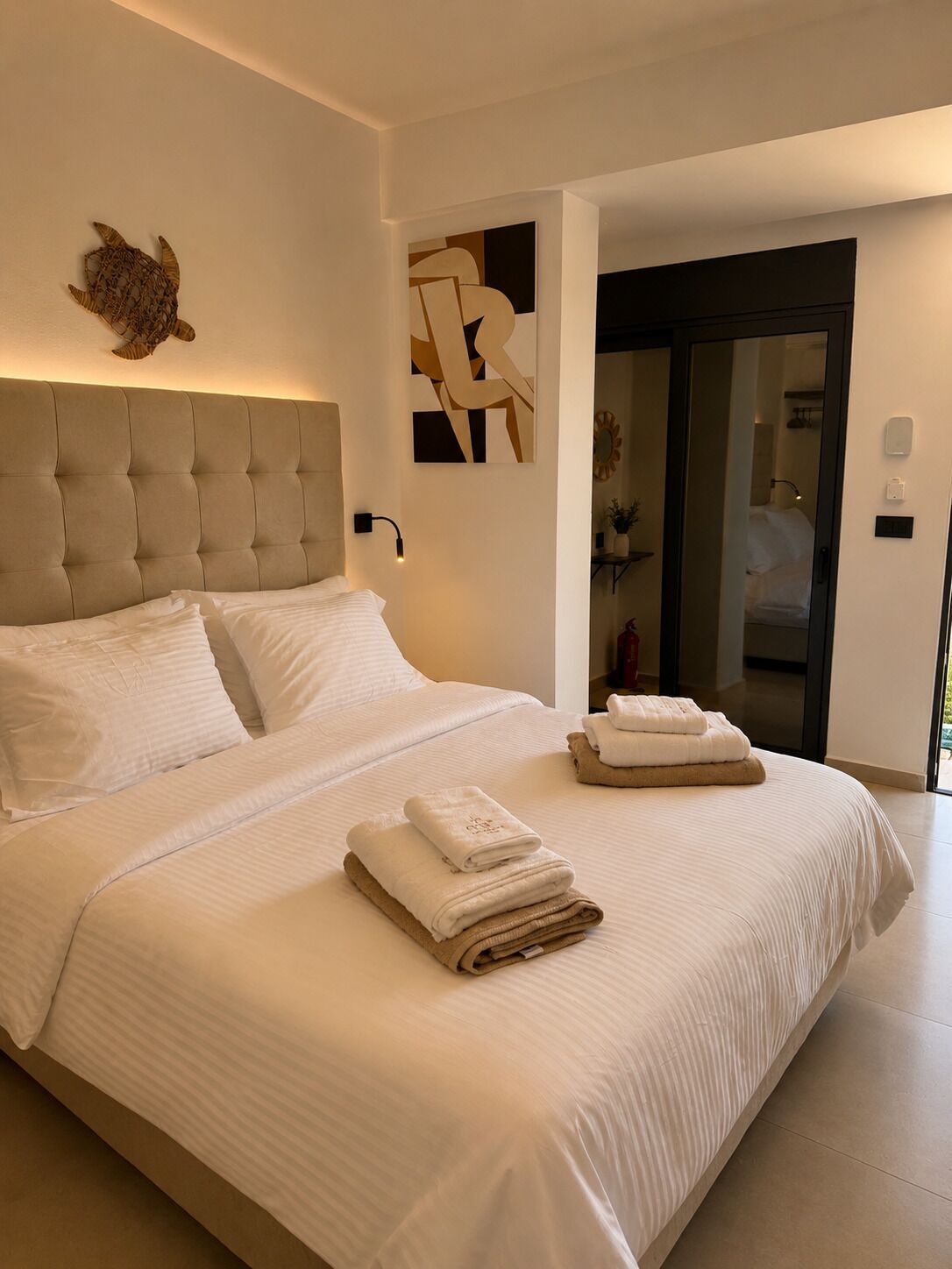 Luxury Suite, Partial Sea View | In-room safe, desk, laptop workspace, soundproofing