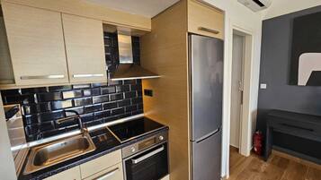 Junior-suite - hawaiiansk terrasse - delvis havudsigt | Privat køkken