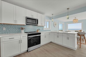 Fridge, microwave, oven, stovetop - Newly Renovated and Pet Friendly Oceanfront 4 Bedroom Home at Channelbend (Surf City)