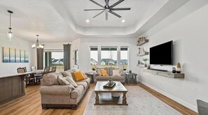 TV, fireplace - Luxury Nampa Home with Hot Tub, Outdoor Kitchen, Gym, Office, & Pickleball Court (Nampa)