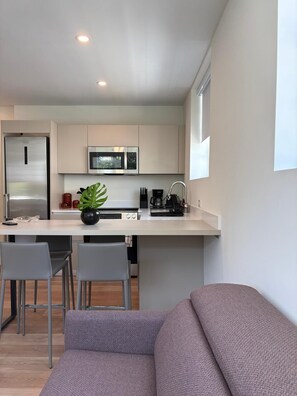 Apartamento superior | Área de estar