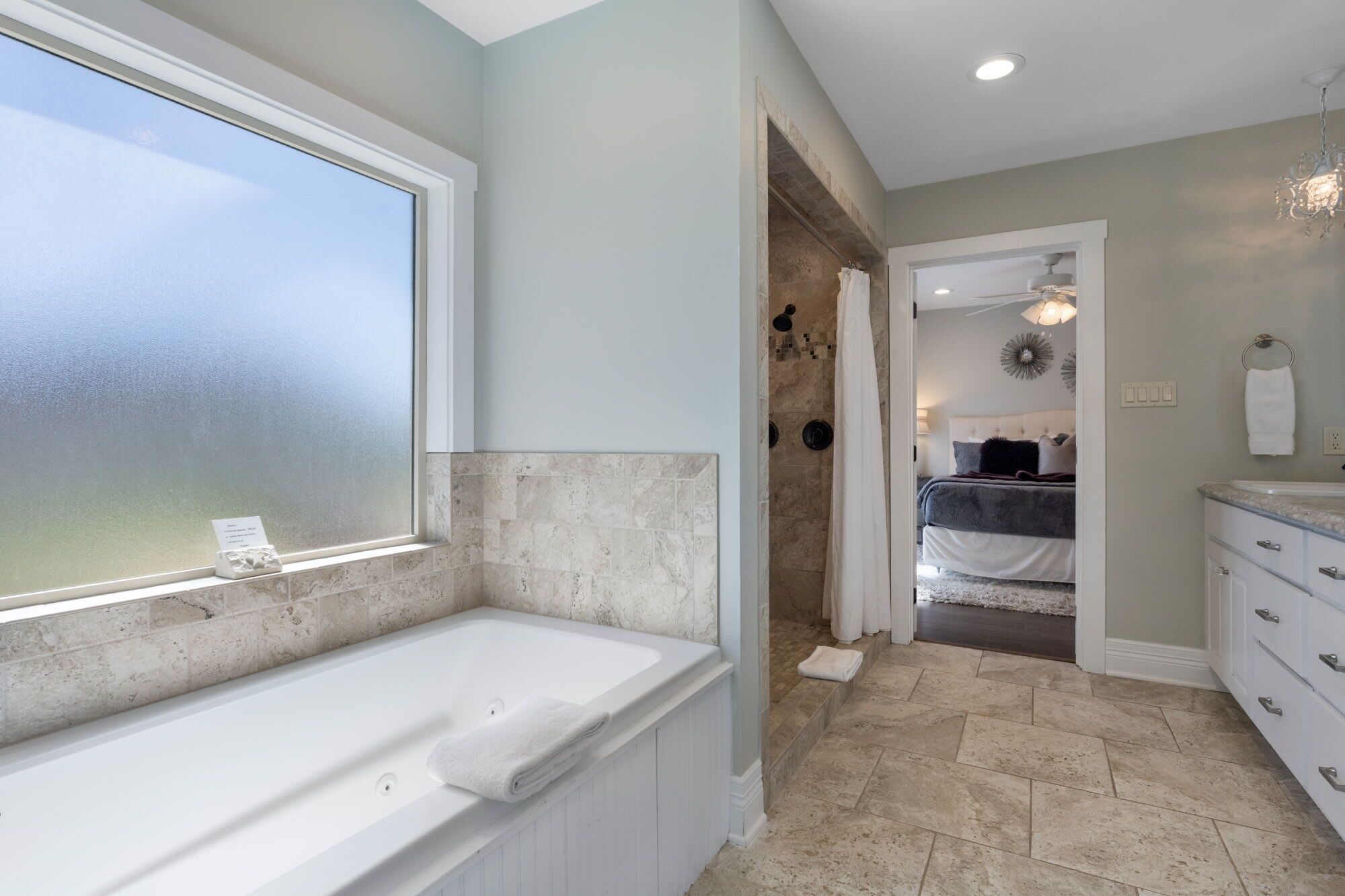 Shower, hair dryer, towels, shampoo