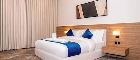 Suite familiar | Cortinas blackout, tabla de planchar con plancha y wifi gratis