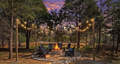 Cozy Retreat with Hot Tub, Fire Pit, Outdoor Dining, & Games 1 mi to Boat Ramp