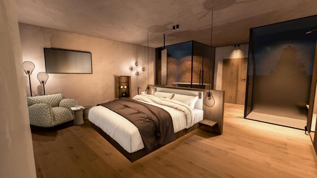 A modern bedroom with a bed, bedside tables, a chair, a mirror, and a large window.