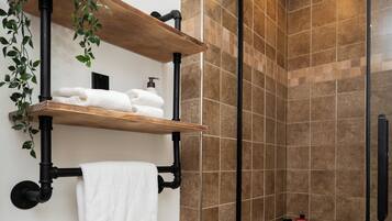 Shower, hair dryer, towels, soap