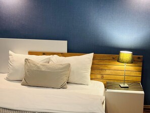 ห้องแฟมิลี่ดับเบิลหรือทวิน | เครื่องนอนระดับพรีเมียม, เตารีด/โต๊ะรีดผ้า, Wi-Fi ฟรี, ผ้าปูที่นอน