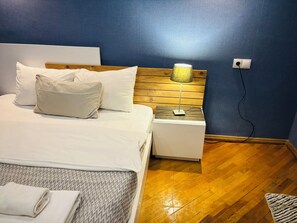 ห้องแฟมิลี่ดับเบิลหรือทวิน | เครื่องนอนระดับพรีเมียม, เตารีด/โต๊ะรีดผ้า, Wi-Fi ฟรี, ผ้าปูที่นอน