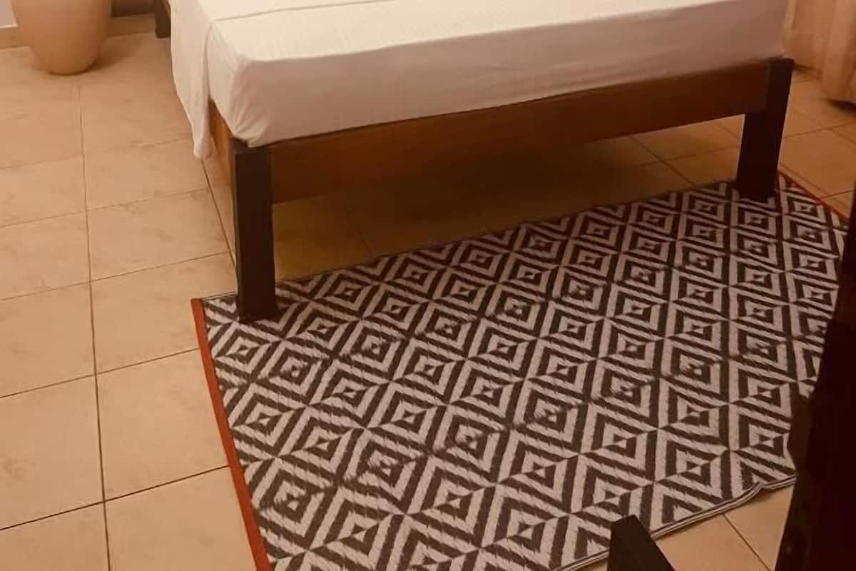 Deluxe Double Room, Private Bathroom | In-room safe, blackout drapes, soundproofing, iron/ironing board