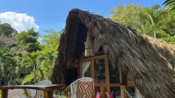 Deluxe Bungalow, Balcony, Pool View | Outdoor dining