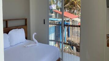 Habitación de lujo con 1 cama matrimonial o 2 individuales, vista a la playa