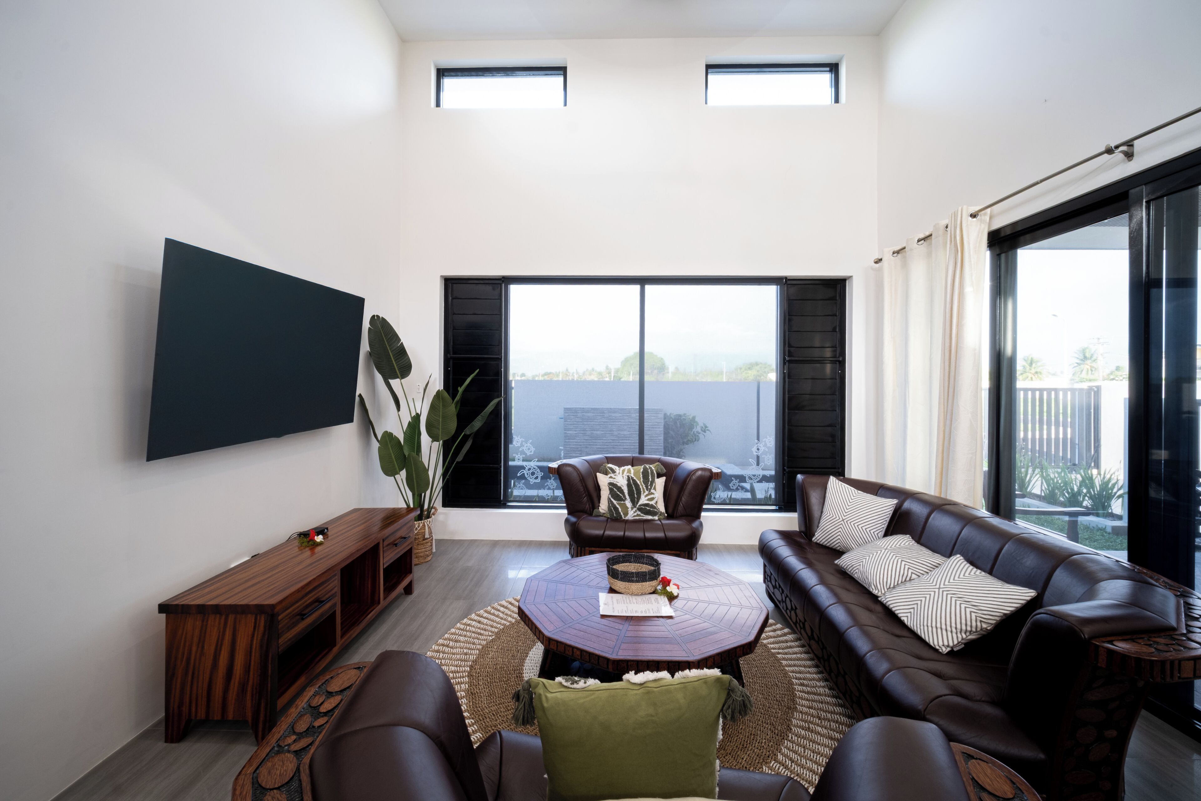 Habitación Deluxe, patio | Área de sala de estar