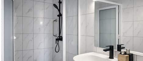 Shower, hair dryer, towels, soap